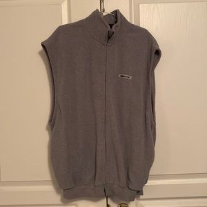 Grey Essentials Fear of God fleece vest . Great for layering. Popular brand.